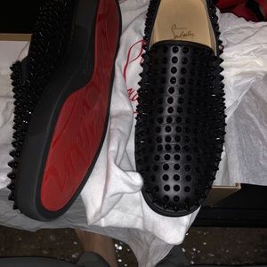 Christian Louboutin roller boat
